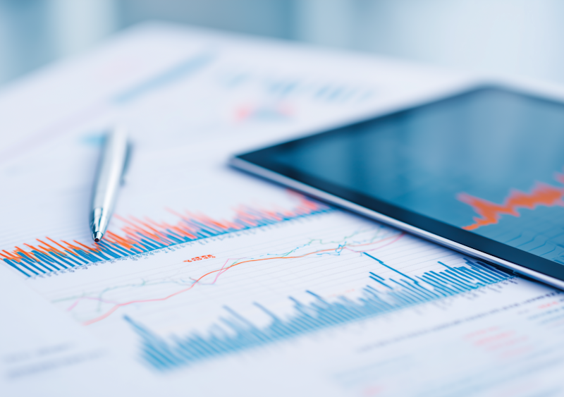 Financial charts and analytics showing portfolio growth and investment performance